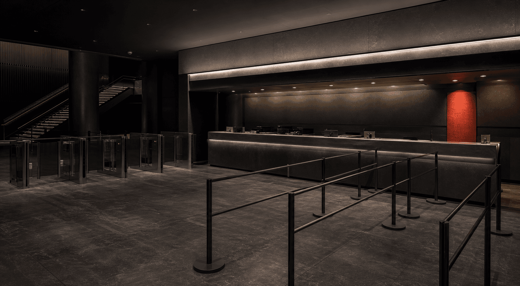 A bright commerce service counter with digital screens and organized customer flow